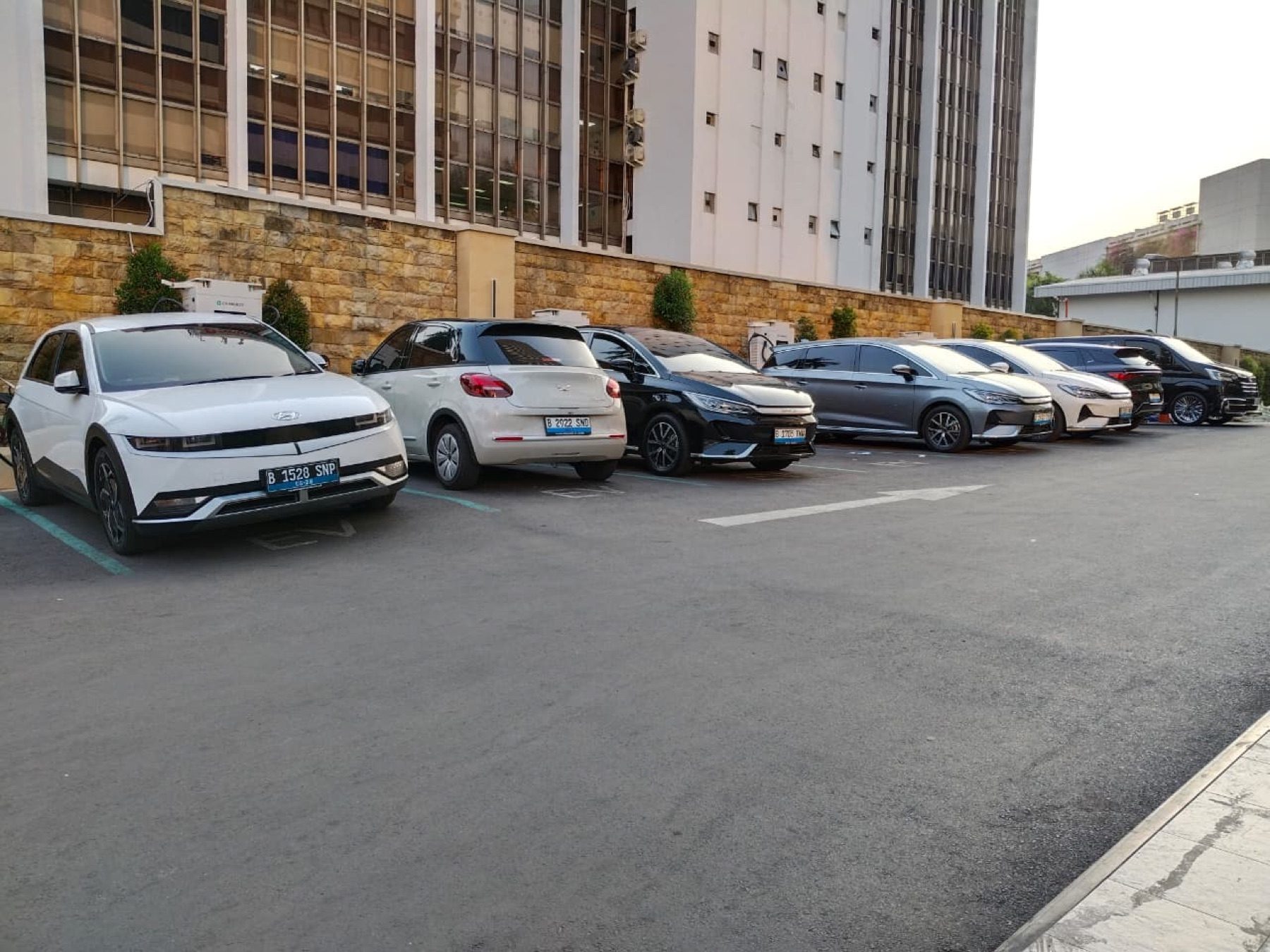 The open-air car park beside the lobby